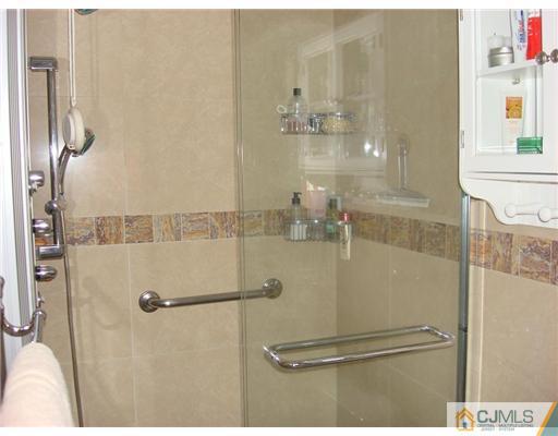 16 Fishel Road Edison, NJ 08820 - Photo 17 of 25 a bathroom with a shower