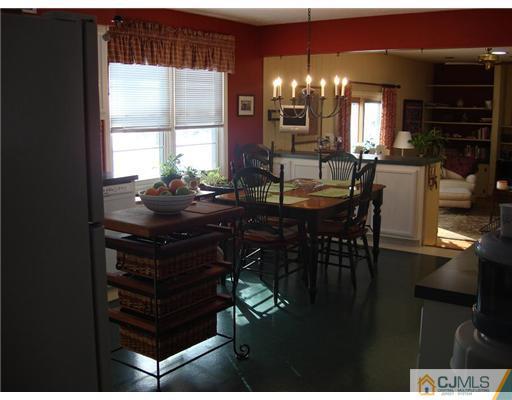 16 Fishel Road Edison, NJ 08820 - Photo 5 of 25 a view of a dining room with furniture and window