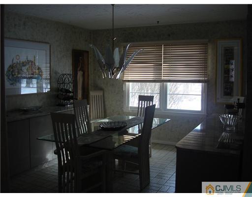 16 Fishel Road Edison, NJ 08820 - Photo 8 of 25 a view of a dining room with furniture