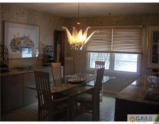 16 Fishel Road Edison, NJ 08820 - Photo 9 of 25 a dining room with furniture and window