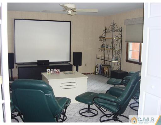 16 Fishel Road Edison, NJ 08820 - Photo 10 of 25 a living room with furniture and a window