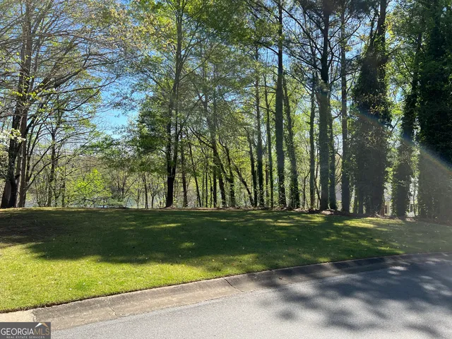 a view of a golf course with a trees