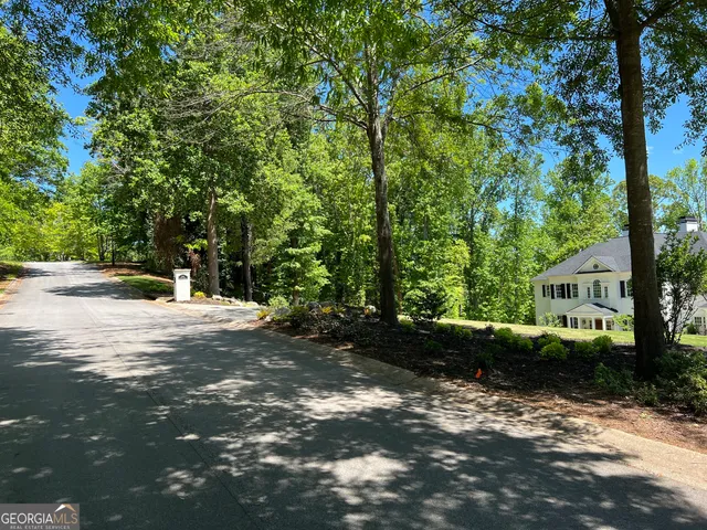 a view of road with trees