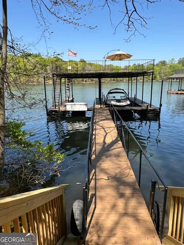 a view of a balcony with two chairs