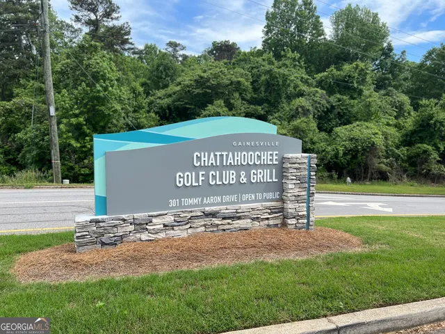 a white bench sitting in the middle of a building