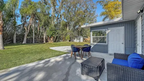 a garden view with a seating space