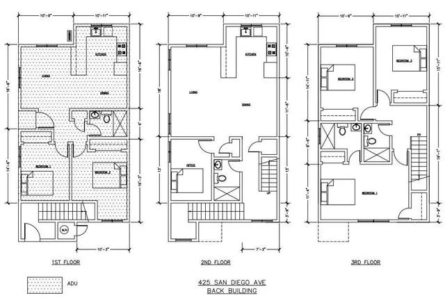 a black and white photo of a living room