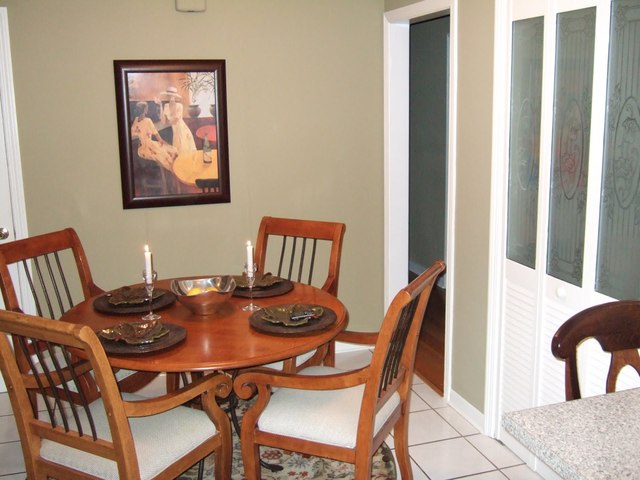 423 Highview Avenue Elmhurst, IL 60126 - Photo 7 of 10 a dining room with furniture and wooden floor