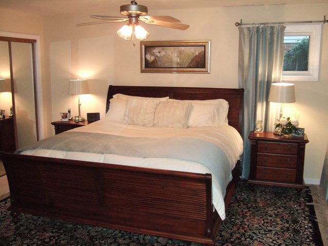 423 Highview Avenue Elmhurst, IL 60126 - Photo 10 of 10 a large bed in a bedroom next to a window