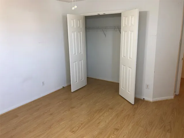 a view of swimming pool in front of yard