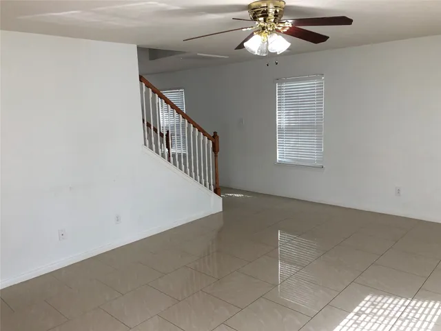 a kitchen with a refrigerator sink and stove