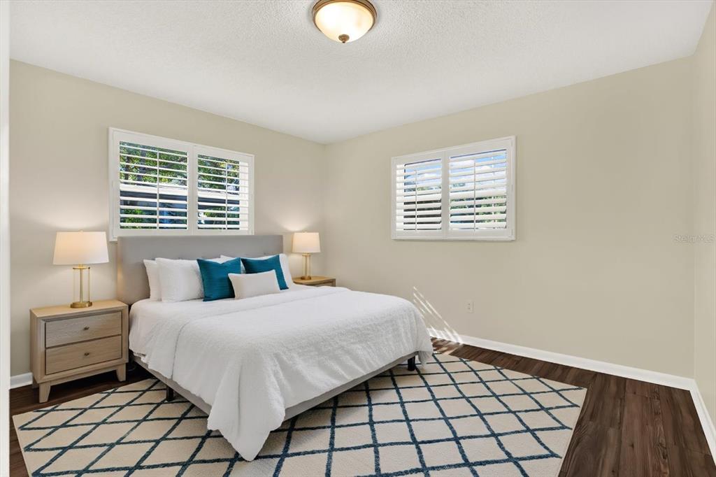 3485 Pine Street Dunedin, FL 34698 - Photo 5 of 22 a bedroom with a bed and a window