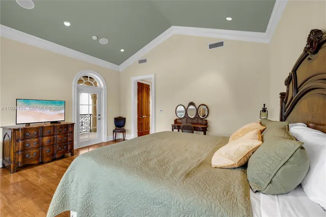 a bathroom with a sink shower and a mirror