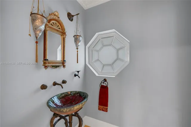 a kitchen that has a stove and a table