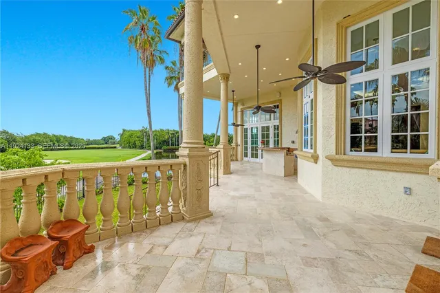 a view of a golf course with a lake