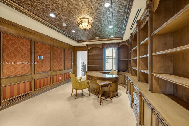 a view of a chairs and table in a balcony