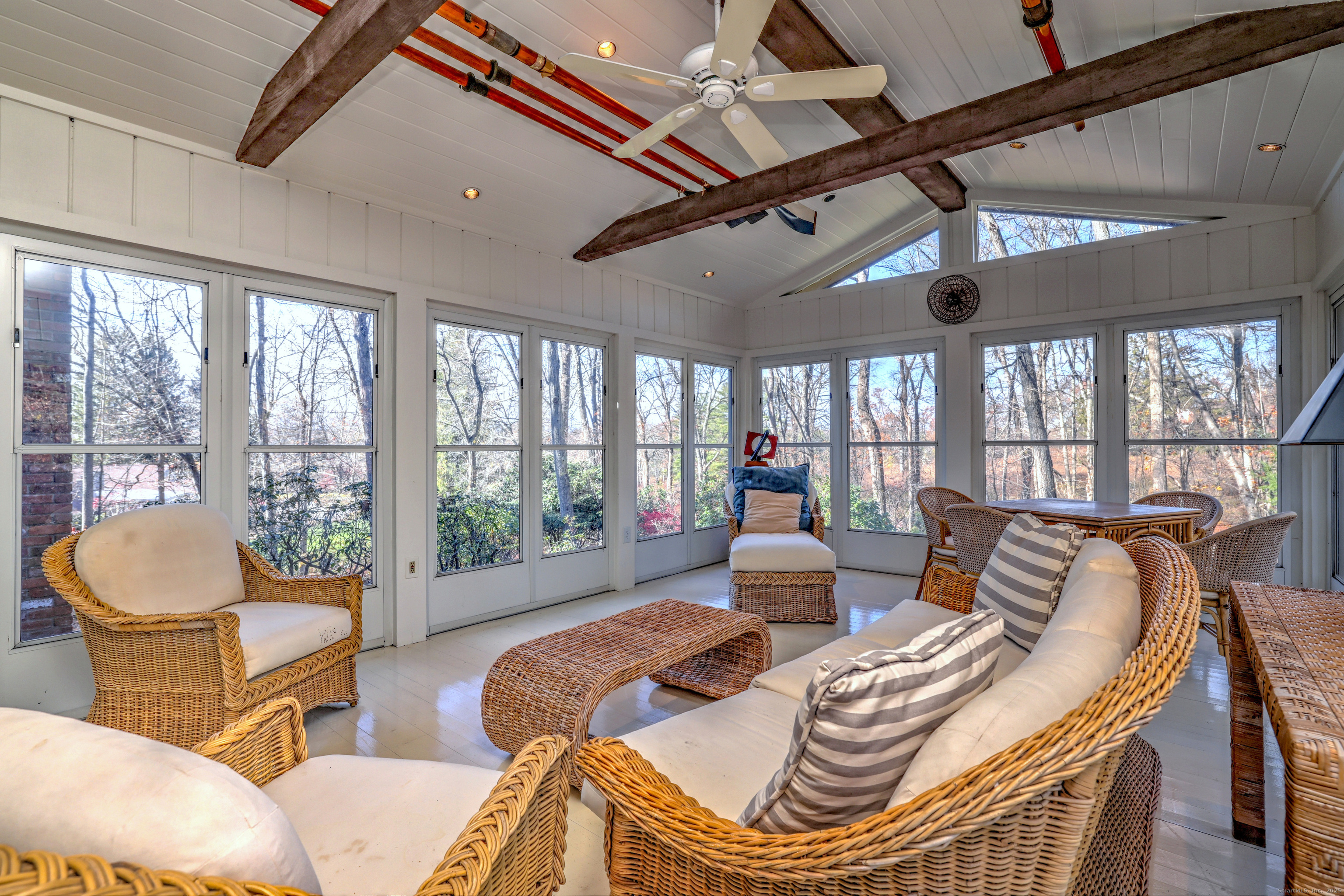 70 Woodfield Road Woodbridge, CT 06525 - Photo 11 of 37 a living room with furniture and a floor to ceiling windows