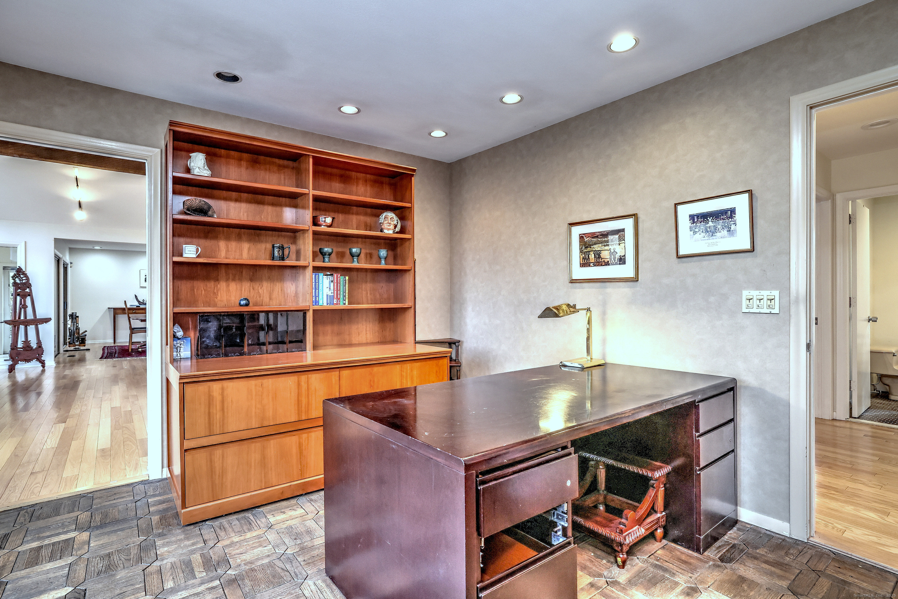 70 Woodfield Road Woodbridge, CT 06525 - Photo 17 of 37 a living room with stainless steel appliances furniture and a kitchen view