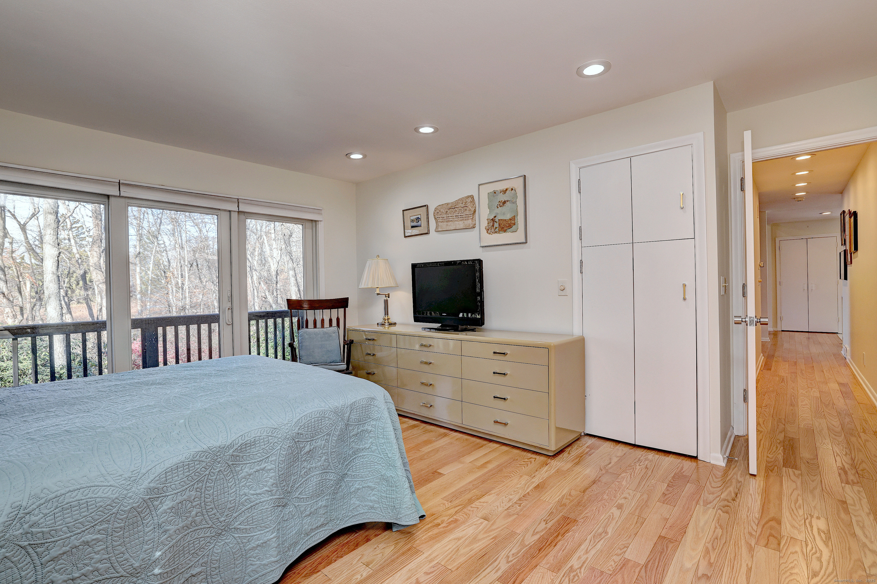 70 Woodfield Road Woodbridge, CT 06525 - Photo 21 of 37 a bedroom with a bed and a flat screen tv