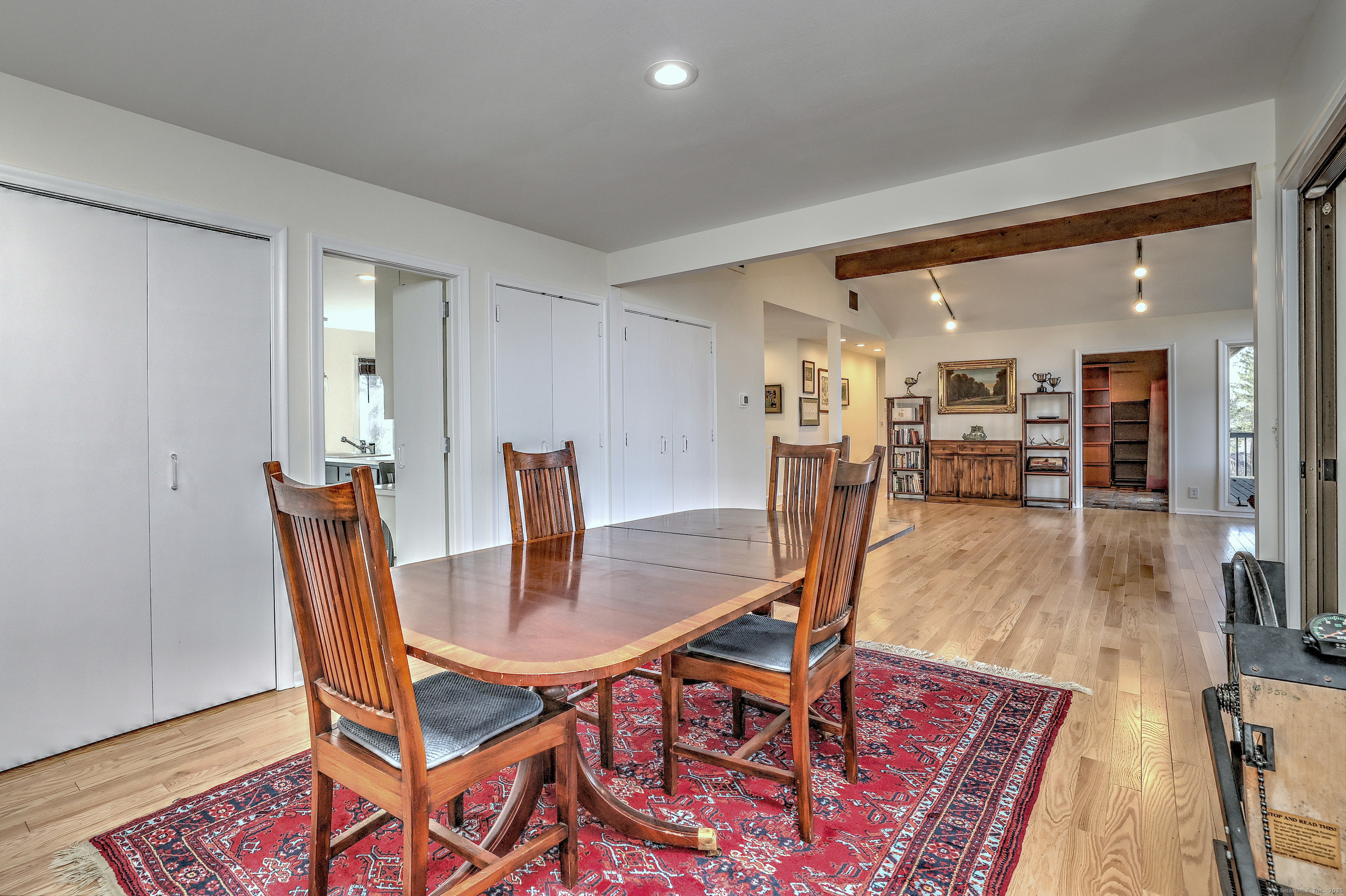 70 Woodfield Road Woodbridge, CT 06525 - Photo 8 of 37 a dining room with furniture and wooden floor
