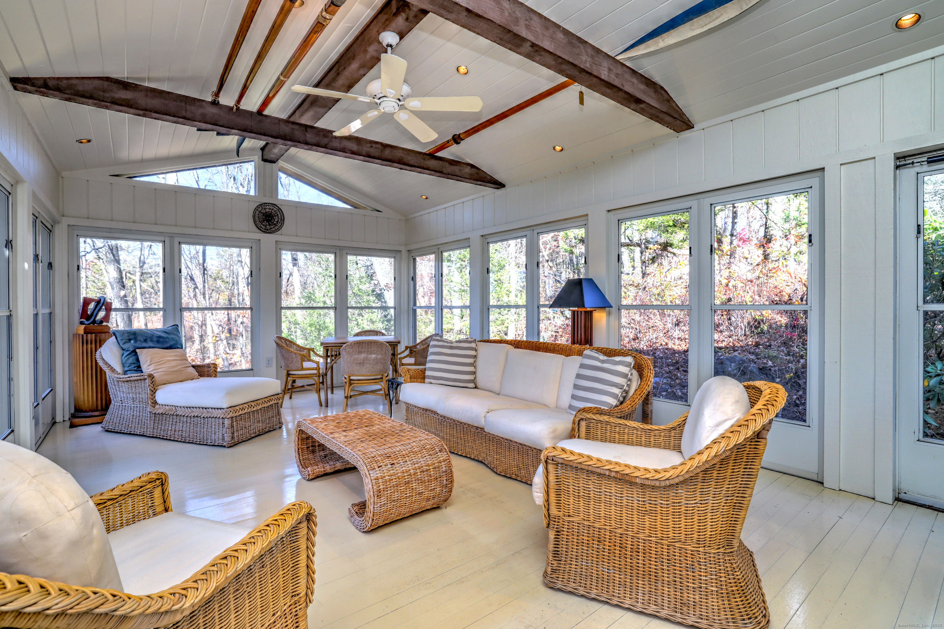 70 Woodfield Road Woodbridge, CT 06525 - Photo 10 of 37 a living room with furniture and a large window