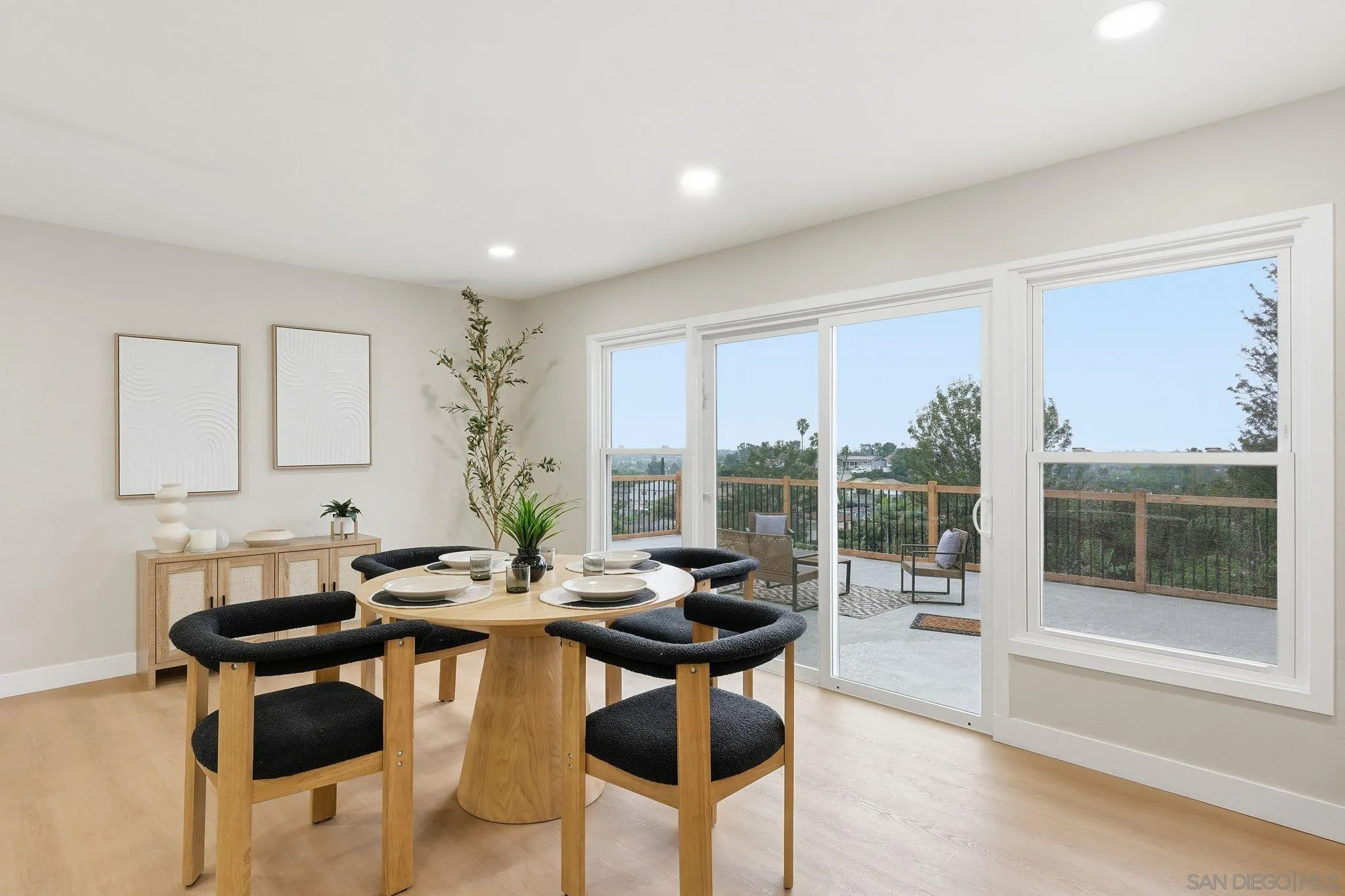 4800 Lee Avenue La Mesa, CA 91942 - Photo 12 of 60 a view of a dining room with furniture and wooden floor