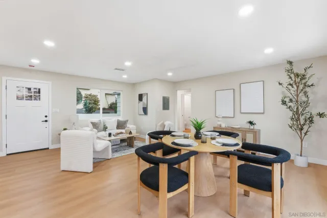 a bedroom with a large bed and a couch