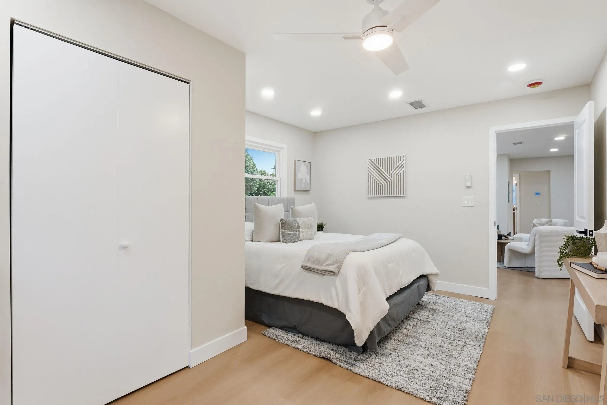 4800 Lee Avenue La Mesa, CA 91942 - Photo 16 of 60 a spacious bedroom with a bed and a couch