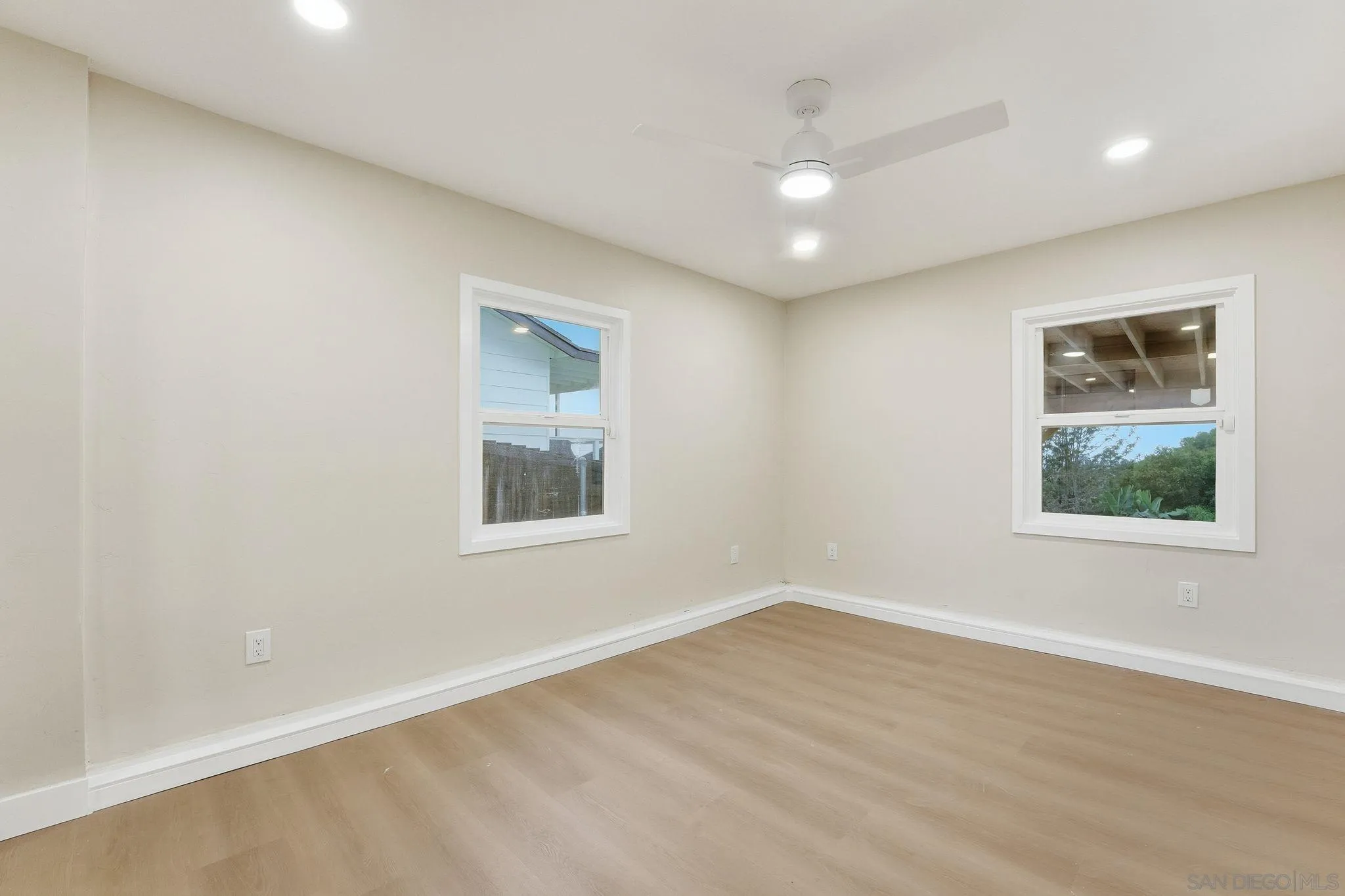 4800 Lee Avenue La Mesa, CA 91942 - Photo 23 of 60 an empty room with wooden floor and a window