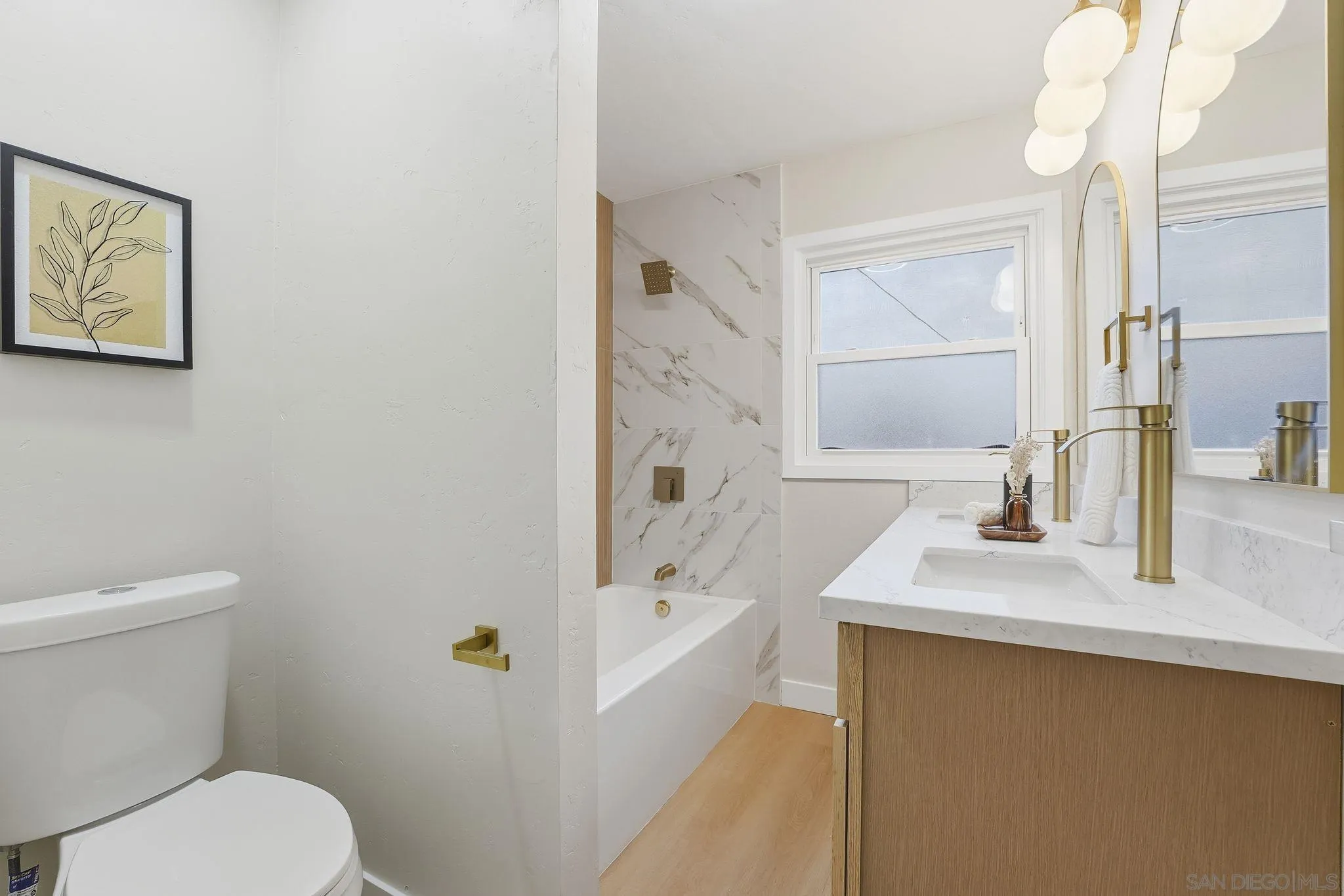 4800 Lee Avenue La Mesa, CA 91942 - Photo 27 of 60 a bathroom with a sink a toilet and shower