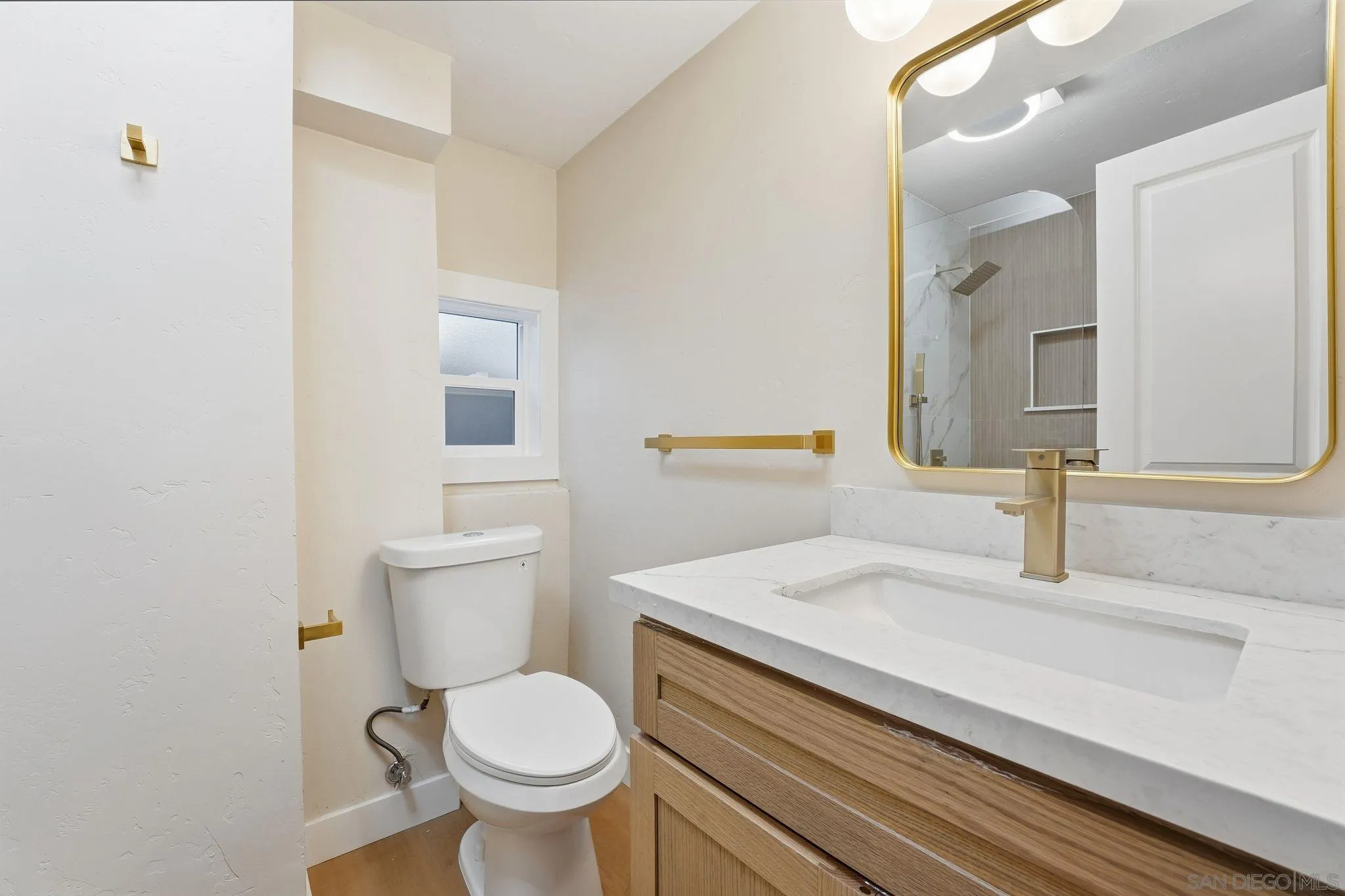 4800 Lee Avenue La Mesa, CA 91942 - Photo 28 of 60 a bathroom with a sink and a toilet
