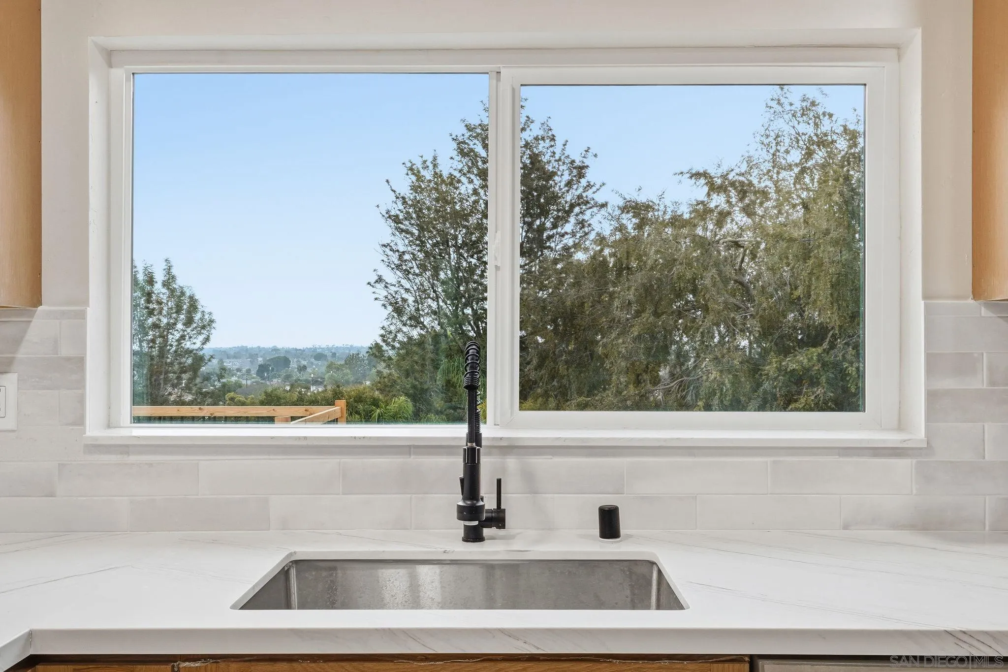 4800 Lee Avenue La Mesa, CA 91942 - Photo 29 of 60 a close up of a sink and a mirror