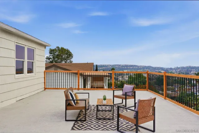 a kitchen with stainless steel appliances granite countertop a refrigerator stove a sink and microwave