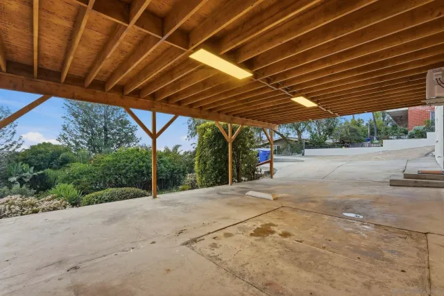 an aerial view of residential houses with city view