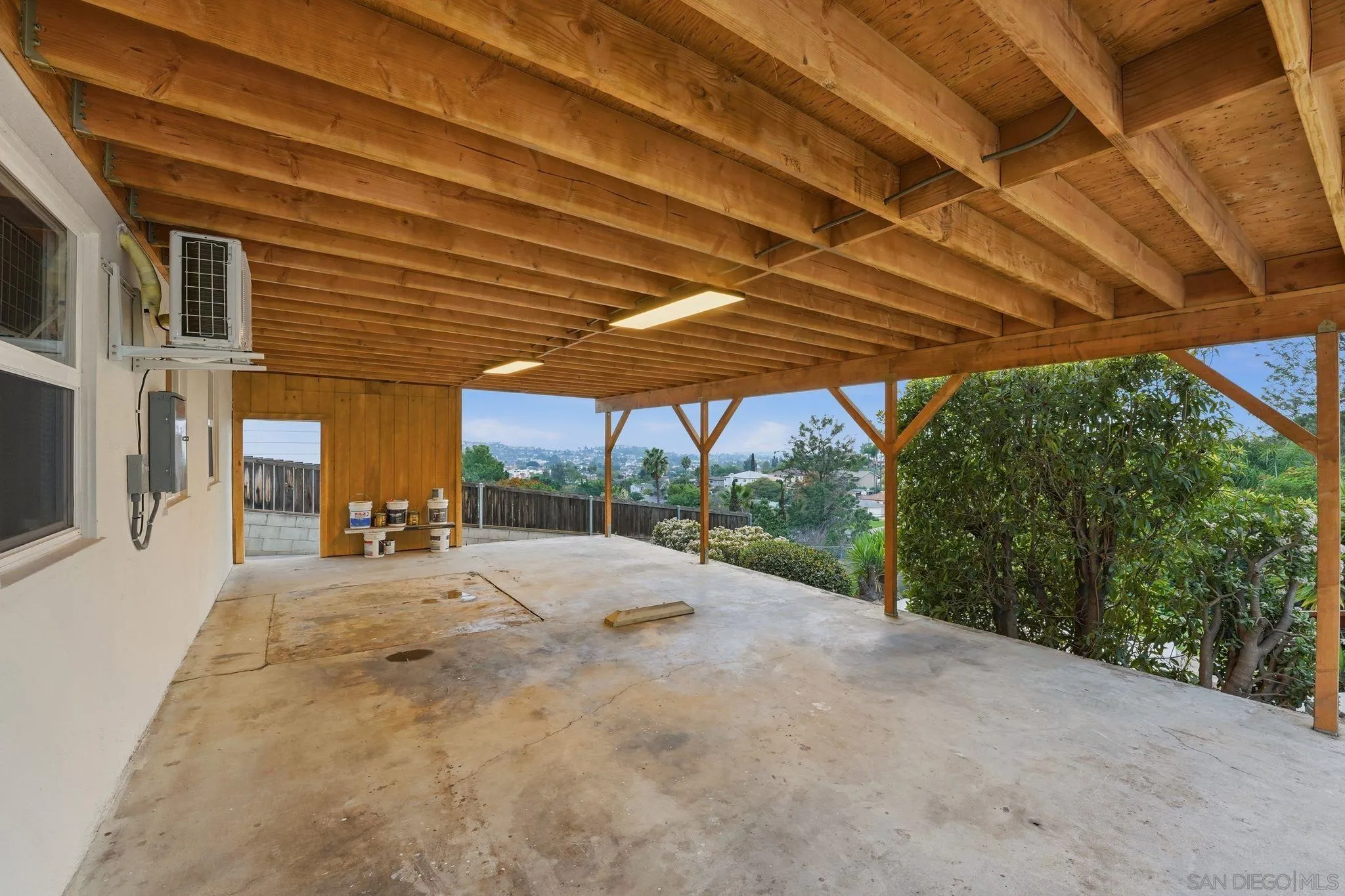 4800 Lee Avenue La Mesa, CA 91942 - Photo 49 of 60 a view of a patio with a table and chairs under an umbrella