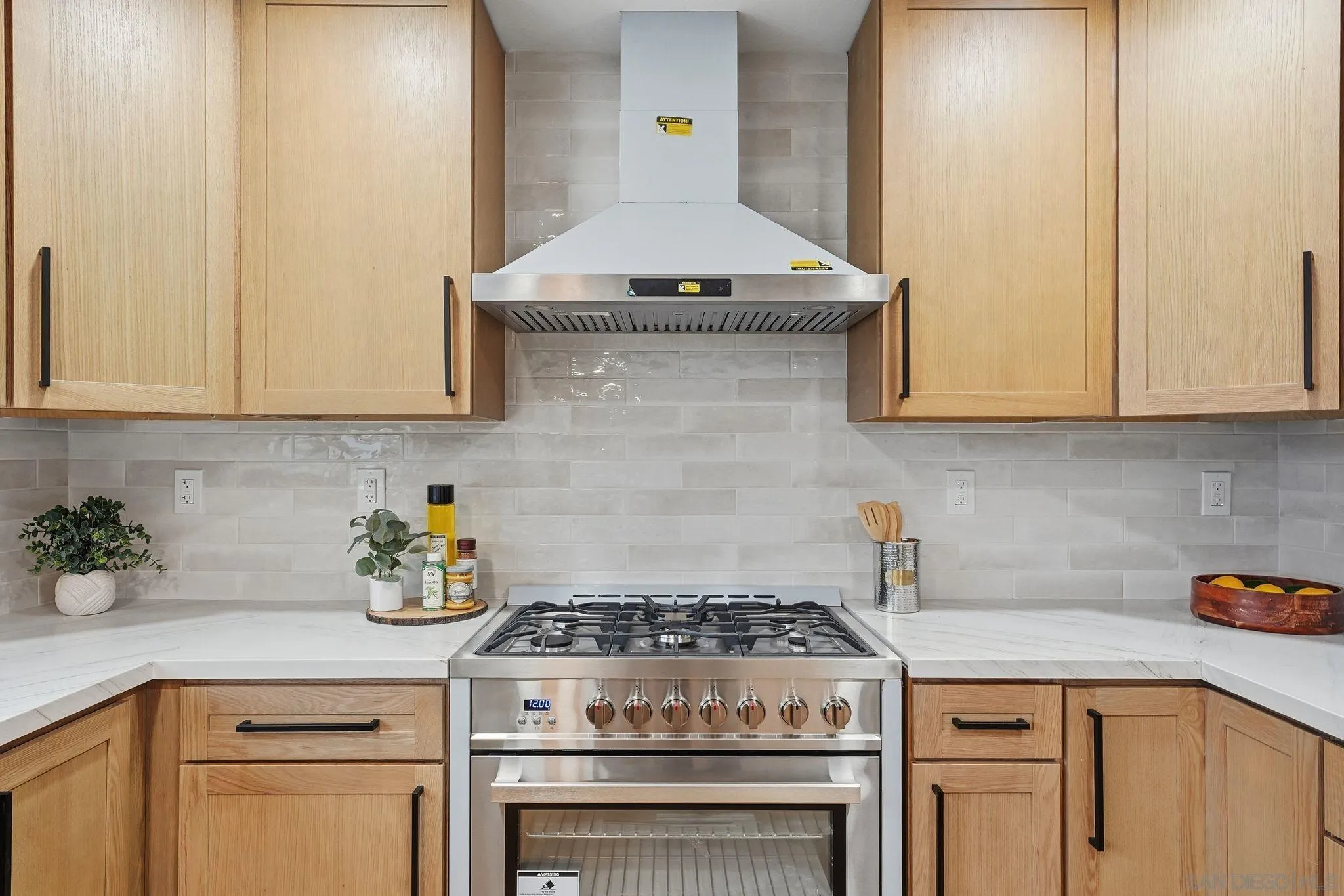 4800 Lee Avenue La Mesa, CA 91942 - Photo 10 of 60 a stove top oven sitting inside of a kitchen