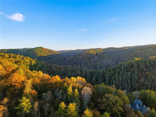 a view of a bathroom with a shower and a sink