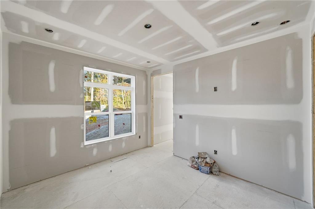1783 Hunter Drive Ranger, GA 30734 - Photo 17 of 40 an empty room with windows