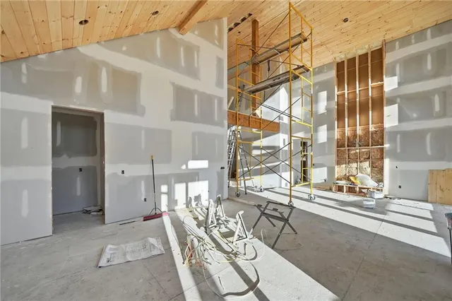 a view of a building with a window and glass door