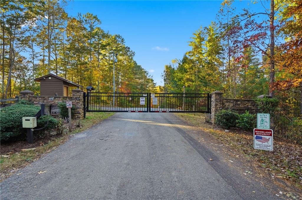 1783 Hunter Drive Ranger, GA 30734 - Photo 40 of 40 a view of road with wooden fence