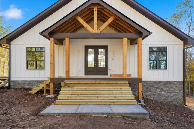 a front view of a house with a porch