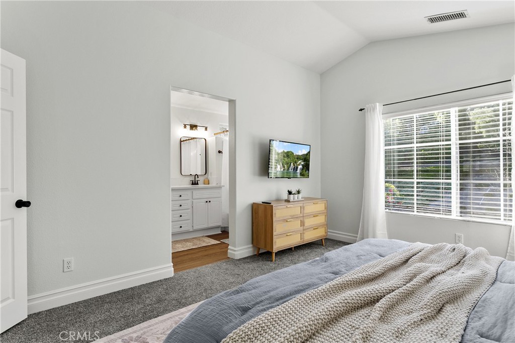 81 Plateau Aliso Viejo, CA 92656 - Photo 14 of 31 a bedroom with a bed mirror and window