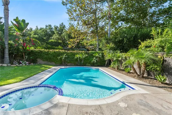 a view of swimming pool from a lake view