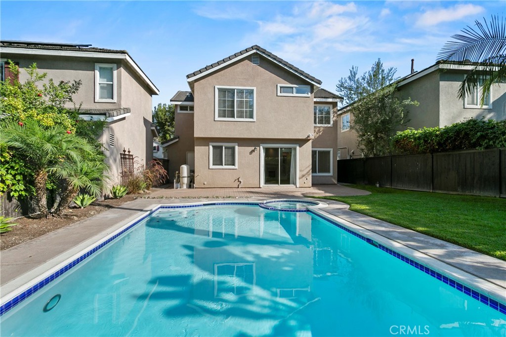 81 Plateau Aliso Viejo, CA 92656 - Photo 28 of 31 a view of house with a swimming pool