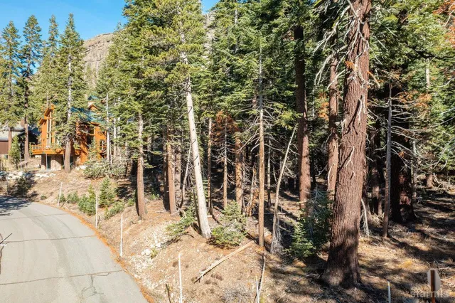 a view of a city with mountains in the background