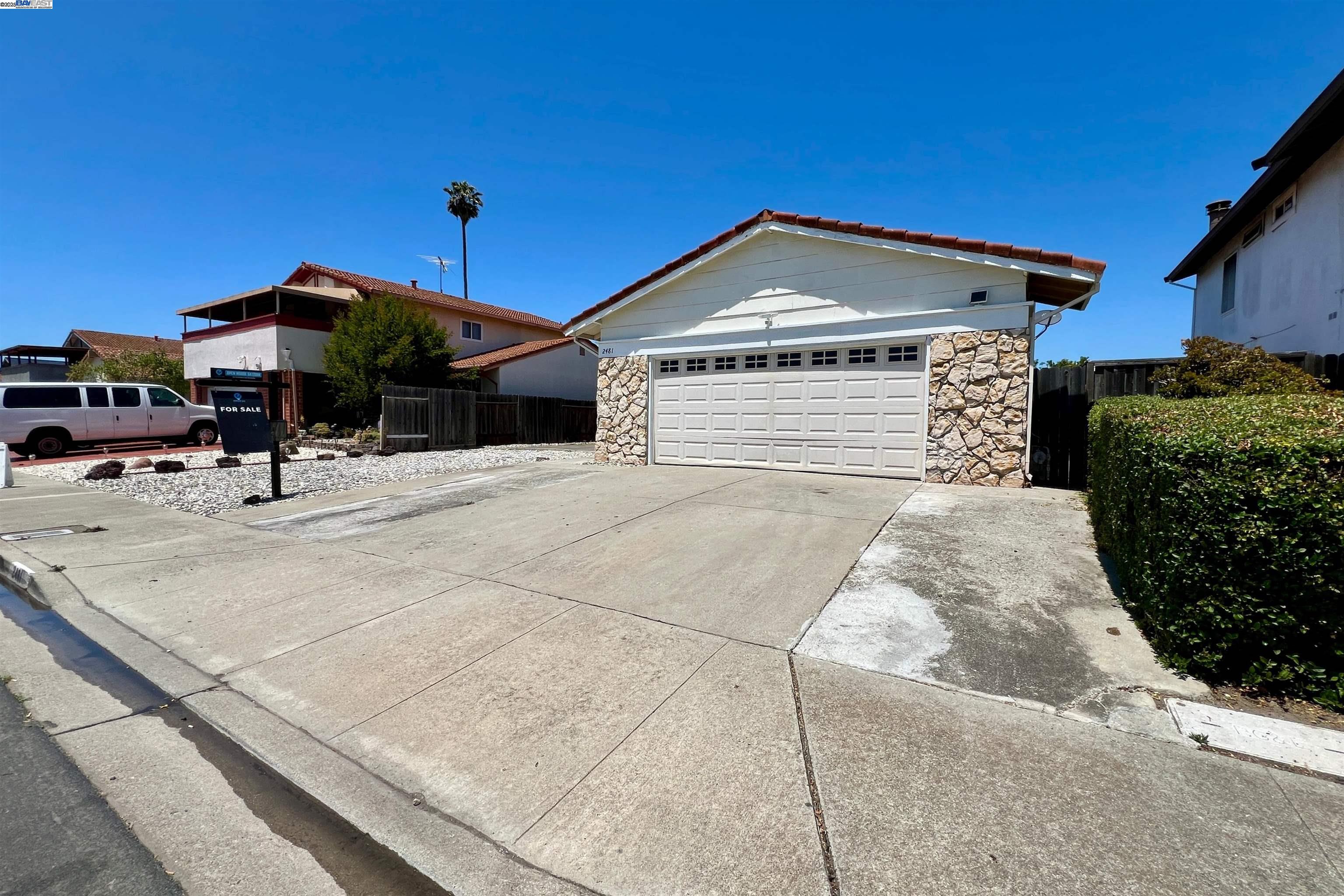 a view of a house with a snow in the yard
