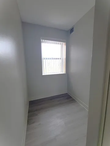 an empty room with a window
