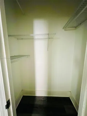 a view of small space with racks on the wall