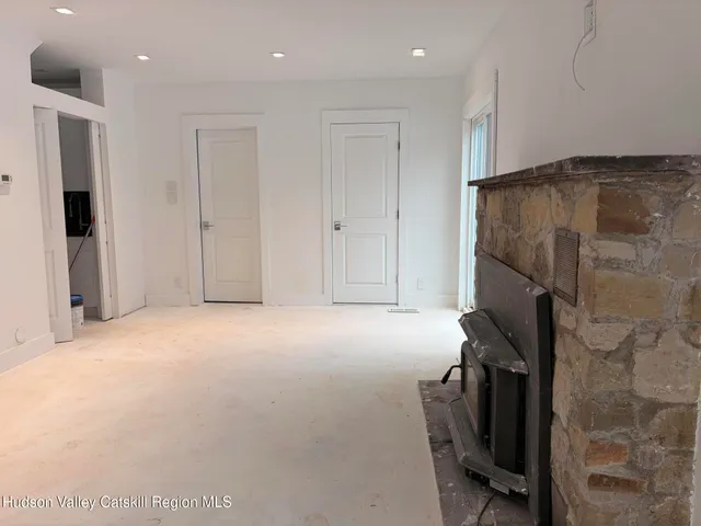 a view of hallway with shower