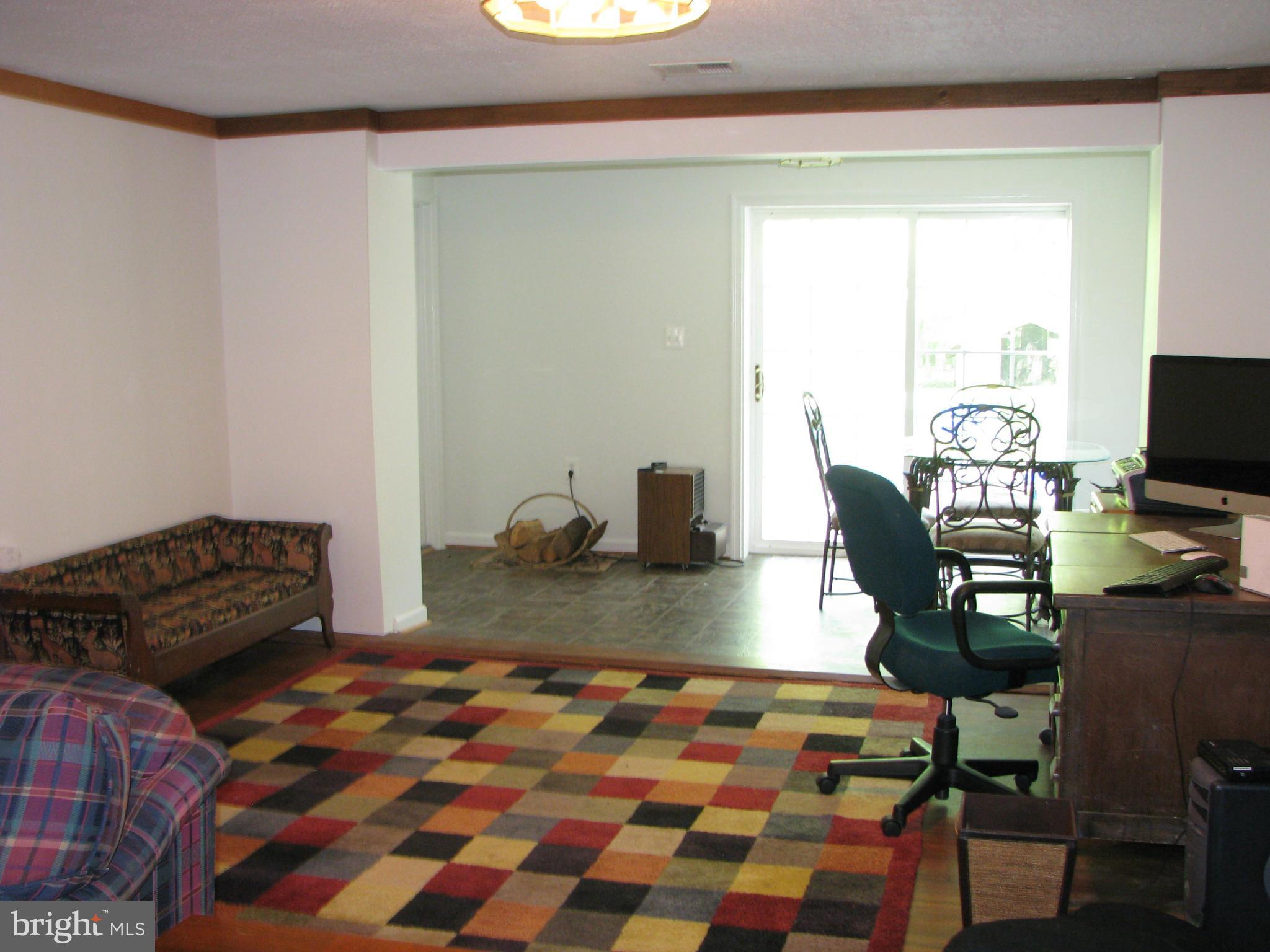 4207 Jackson Mill Road Haymarket, VA 20169 - Photo 19 of 30 a bedroom with a bed and wooden floor